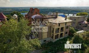 Коттедж 700м², 4-этажный, участок 6 сот.