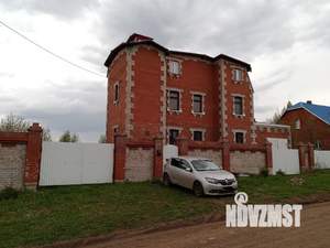 Коттедж 437м², 3-этажный, участок 15 сот.  
