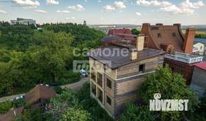 Коттедж 700м², 4-этажный, участок 6 сот.  